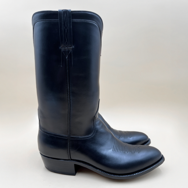 Minimalist calf leather boots by Little's Boot Company featuring a smooth, stitch-free shaft. Made for a classic style and lasting comfort.