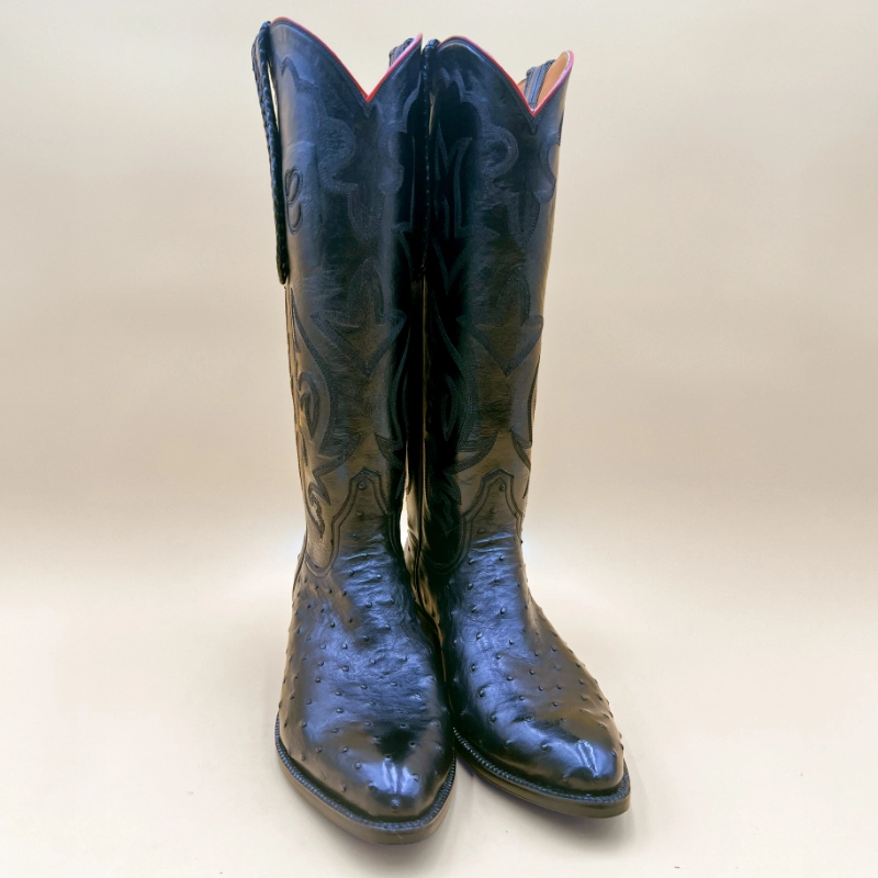 Handcrafted black full-quill ostrich cowboy boots with a tall stitched shaft and classic Western silhouette by Little's Boot Company.
