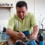 Man working on on custom boots in San Antonio.