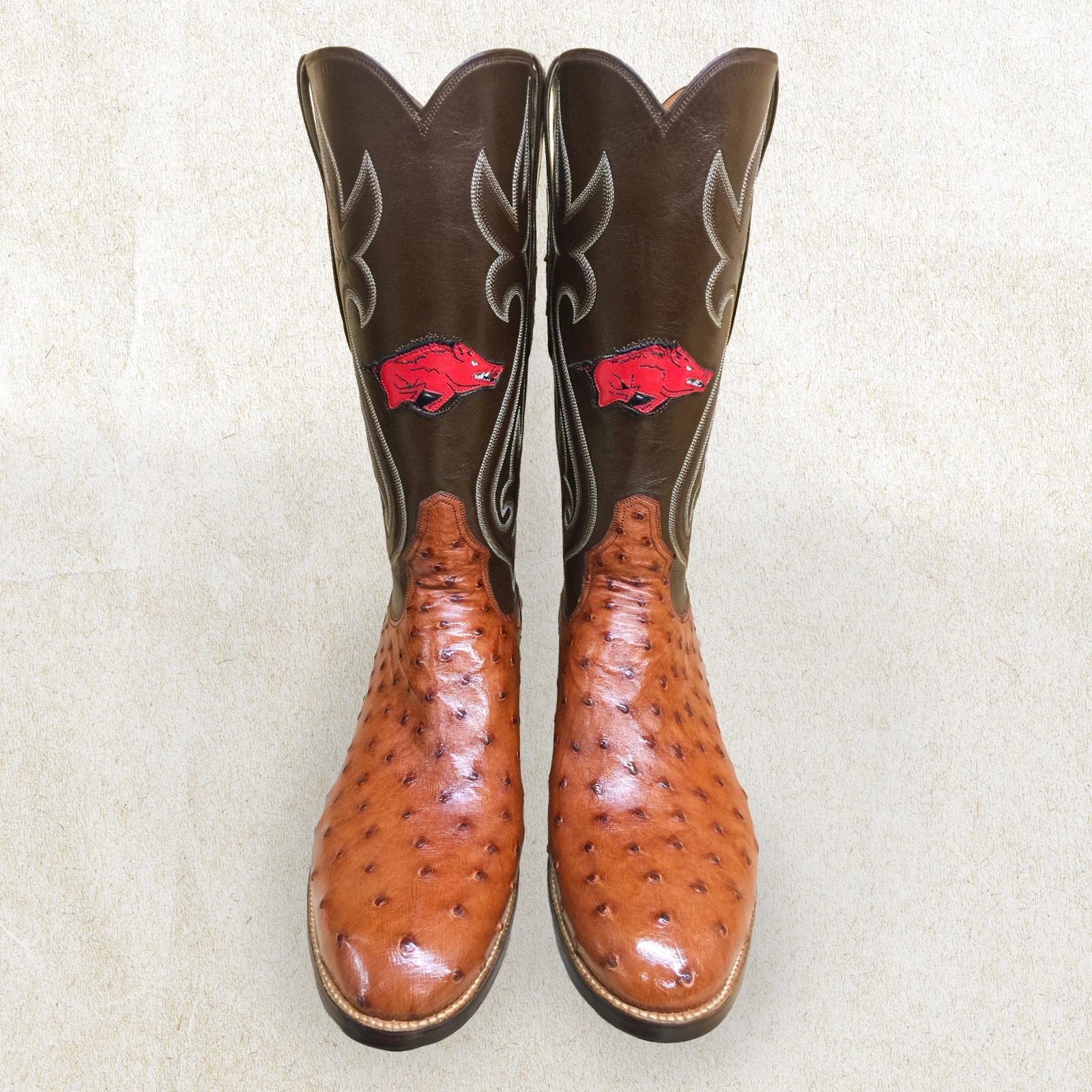 Artisan full-quill ostrich cowboy boots featuring a custom Razorback logo and handcrafted Western detailing by Little's Boot Co.