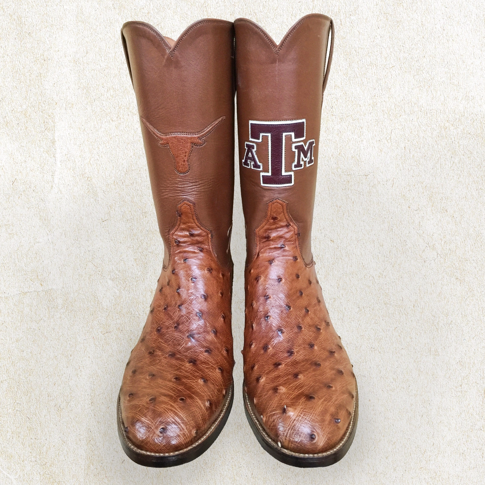 Handcrafted by Little’s Boot Company, these ostrich rivalry boots feature UT Austin and Texas A&M detailing with custom craftsmanship.