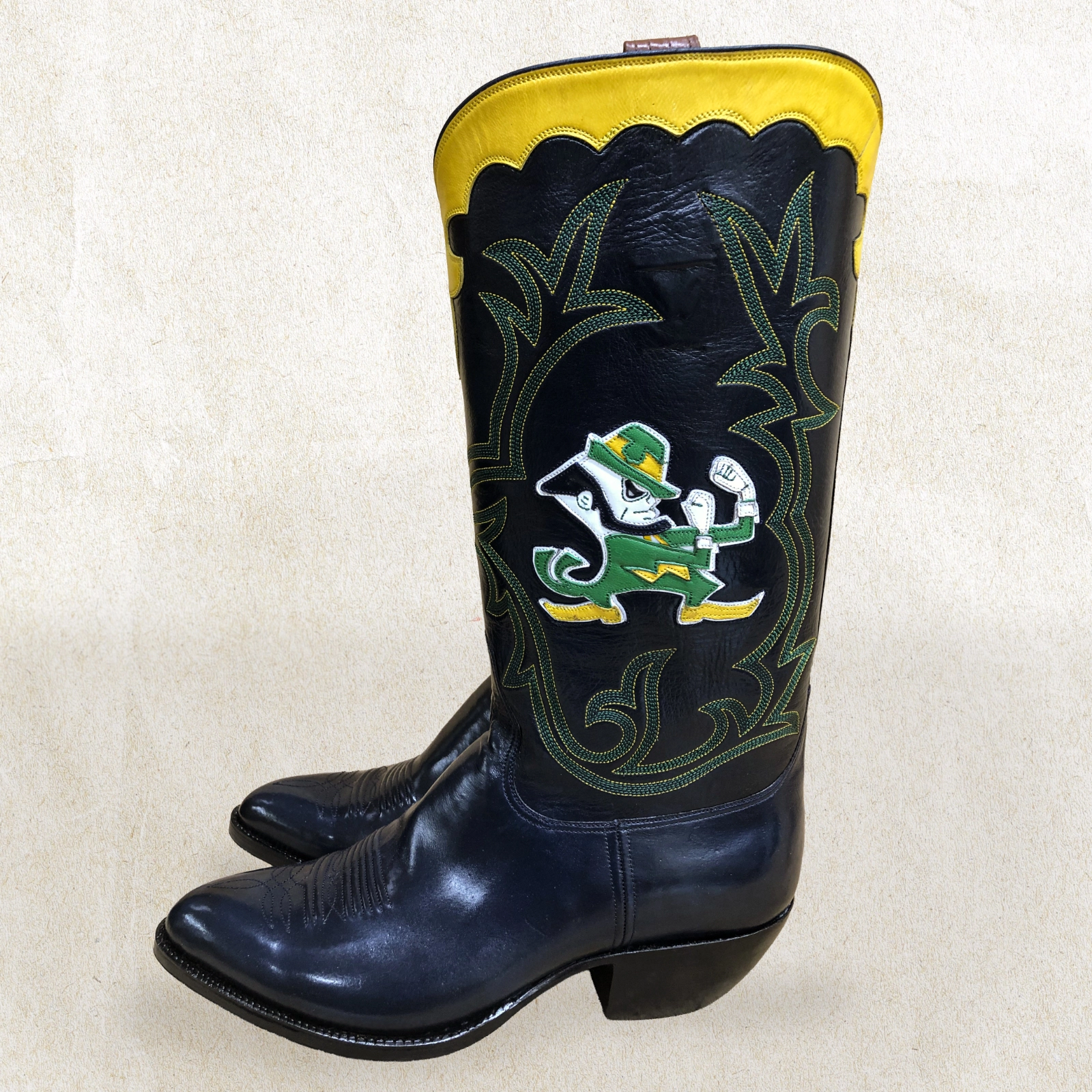Custom Notre Dame boots by Little’s Boot Company, featuring the iconic Fighting Irish leprechaun and handcrafted Western detailing.